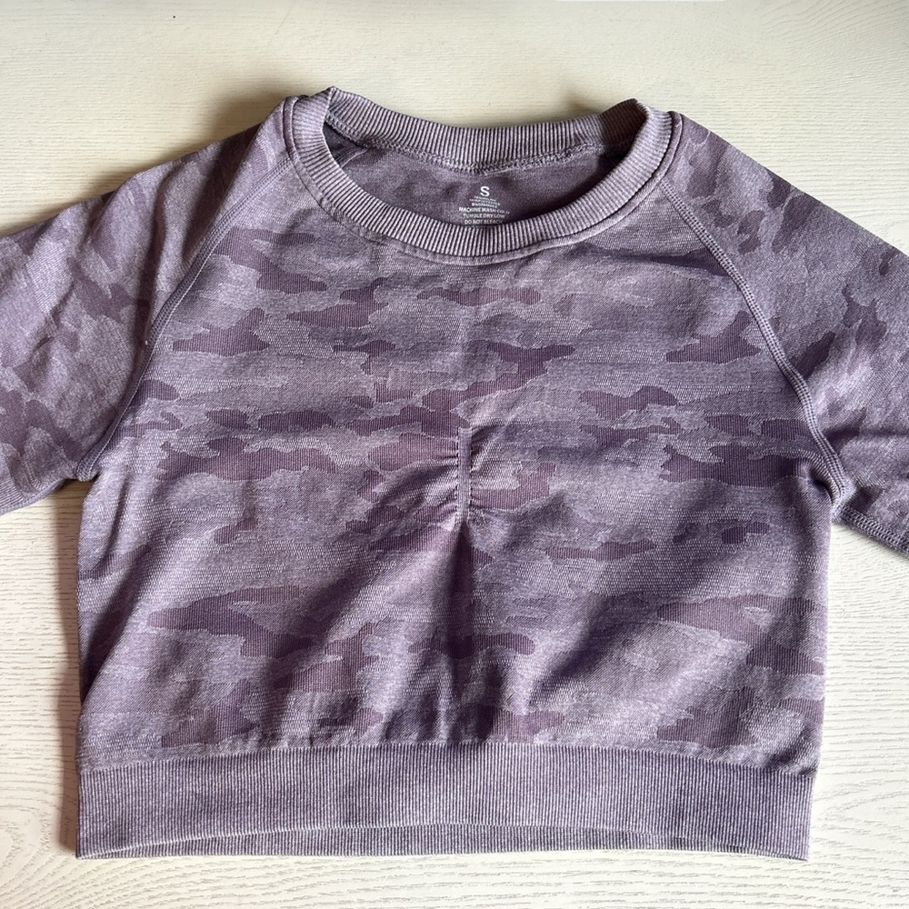 Purple. Workout top. Haven’t worn. Very nice material and comfortable to wear